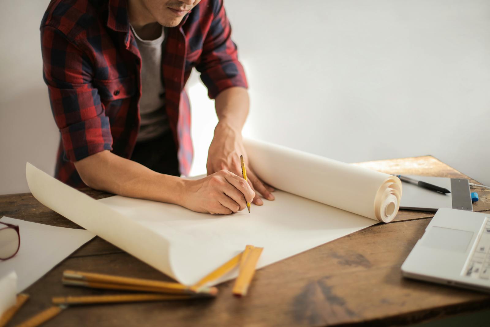 A creative sketching concepts at a desk